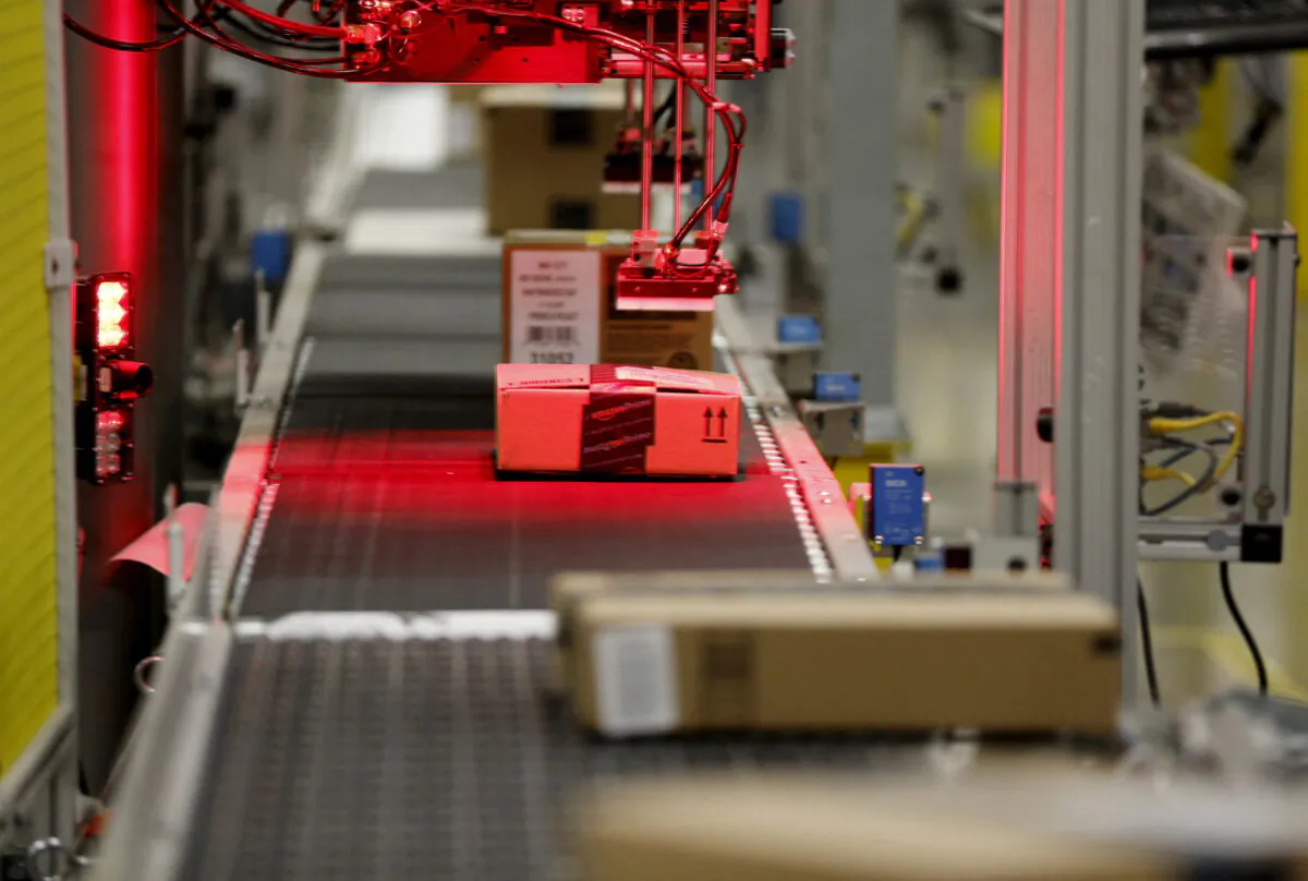 Packaged products are scanned at an Amazon Fulfilment Center in Tracy, Calif., on Aug. 3, 2015. (Robert Galbraith/Reuters)