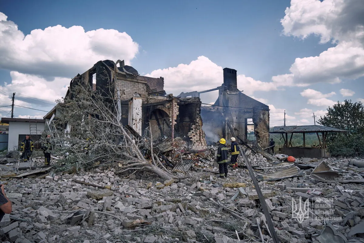 Firefighters work at the site of a destroyed building in Kramatorsk, Ukraine, on July 29, 2022. (Press service of the Donetsk Regional Military Administration/Handout via Reuters)