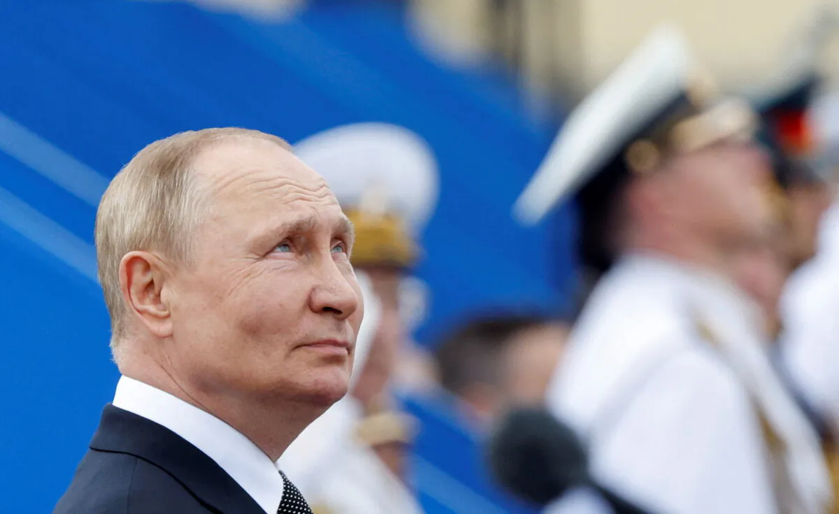 Russian President Vladimir Putin attends a parade marking Navy Day in Saint Petersburg, Russia, on July 31, 2022. (Maxim Shemetov/Reuters)