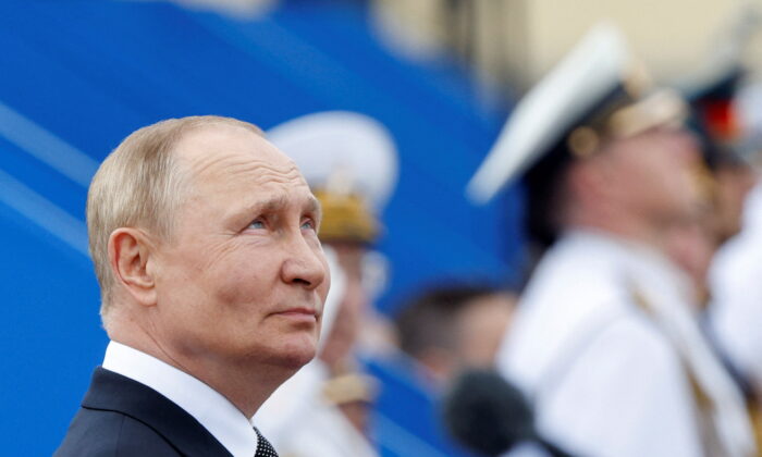 Russian President Vladimir Putin attends a parade marking Navy Day in Saint Petersburg, Russia, on July 31, 2022. (Maxim Shemetov/Reuters)