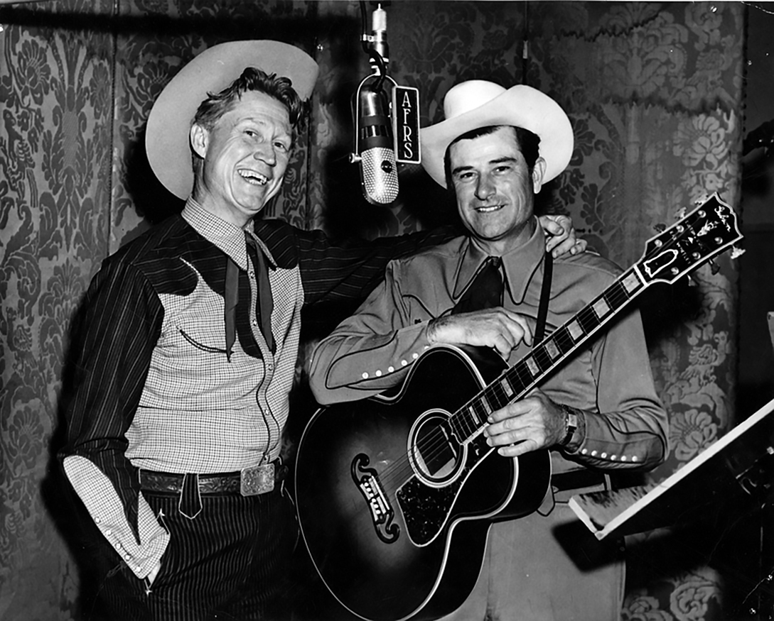 Singer- songwriters Redd Harper (L) and Ray Whitley at a 1951 recording session in the Armed Forces Radio Service studio in Hollywood, Calif. (Public Domain)