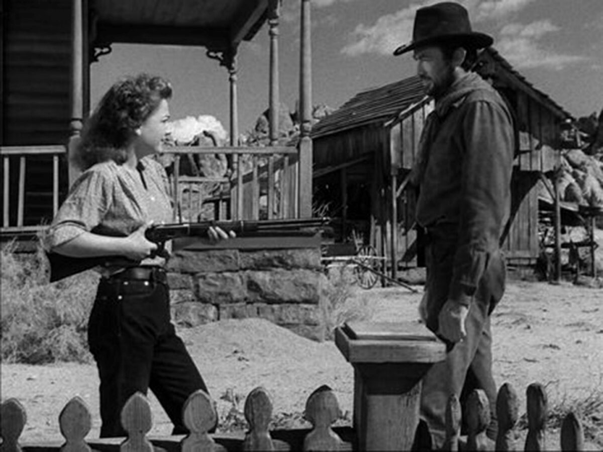 Constance “Mike” Mae (Anne Baxter, L) and Stretch (Gregory Peck) face off in “Yellow Sky.” (20th Century Fox)