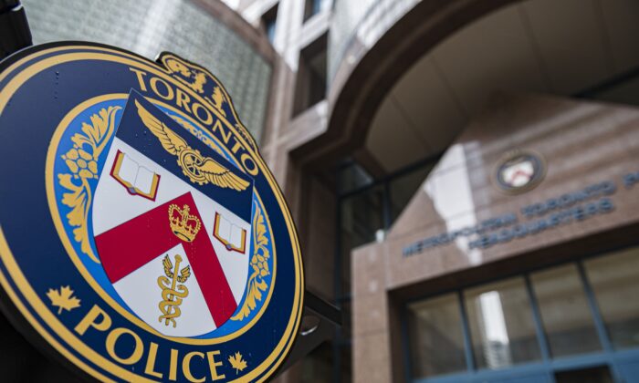 The Toronto Police Services emblem is photographed during a press conference at TPS headquarters in Toronto on May 17, 2022. (The Canadian Press/Christopher Katsarov)
