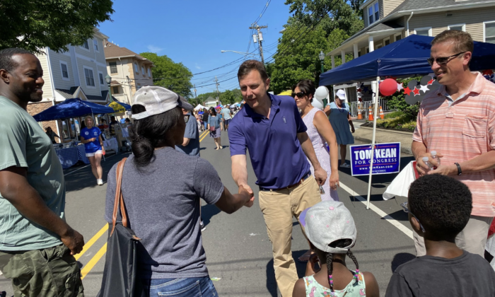 New Jersey Republican Congressional  District 7 candidate Tom Kean, Jr., who is “slightly favored” to unseat Rep. Tom Malinowski (D-N.J.) in November, greets voters during a June block party  in Berkeley Heights. (Courtesy of Tom Kean for Congress)