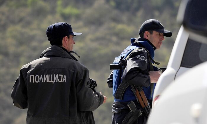 File photo of Macedonia police officers at a check point. (Robert Atanasovski/AFP via Getty Images)