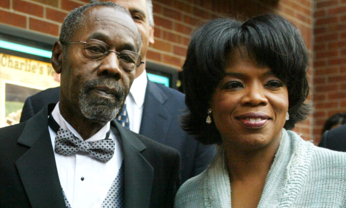 Oprah Winfrey and her father Vernon Winfrey (L) arrive at the opening of Charlie's War at the Nashville Film Festival at the Green Hills Regal Cinema in Nashville, Tenn., on May 2, 2003.  (Adriane Jaeckle/Getty Images)