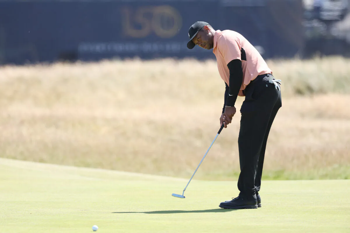 Tiger Woods of the United States puts on the 16th green during a practice round prior to The 150th Open at St Andrews Old Course in St Andrews, Scotland, on July 10, 2022. (Warren Little/Getty Images)