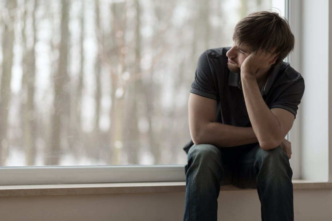 Low testosterone can leave men feeling down and tired, but a healthy diet and exercise can do much to keep testosterone levels from dropping.(Photographee.eu/Shutterstock)