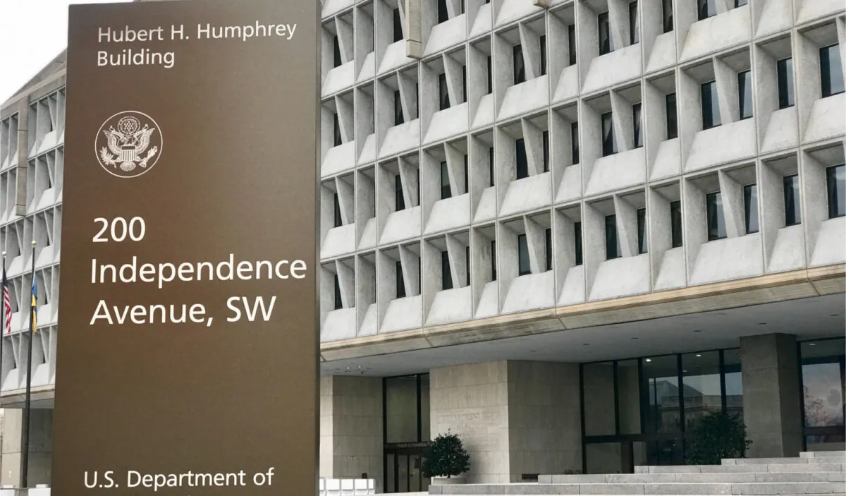 A signage is seen in front of the headquarter building of the Department of Health and Human Services in Washington, D.C., on Jan. 12, 2019. (DCStockPhotography/Shutterstock)