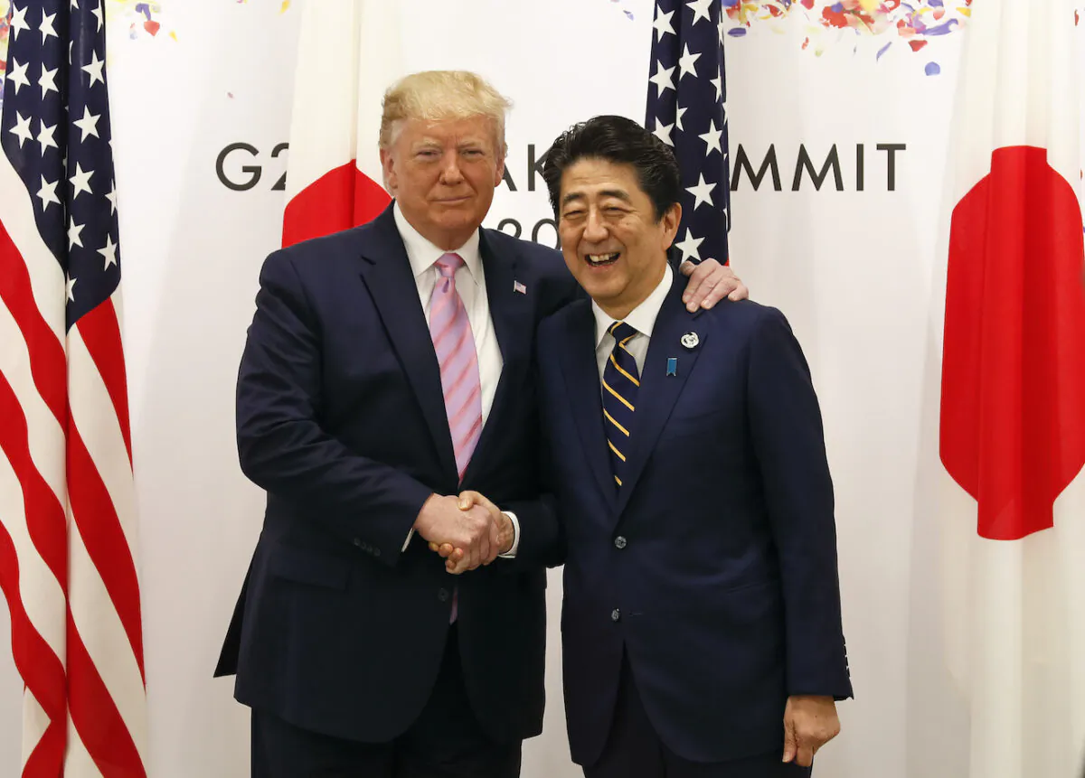 Then-U.S. President Donald Trump with then-Japanese Prime Minister Shinzo Abe at the start of talks at the venue of the G20 Summit in Osaka, Japan, on June 28, 2019. (Kimimasa Mayama/Pool/Getty Images)