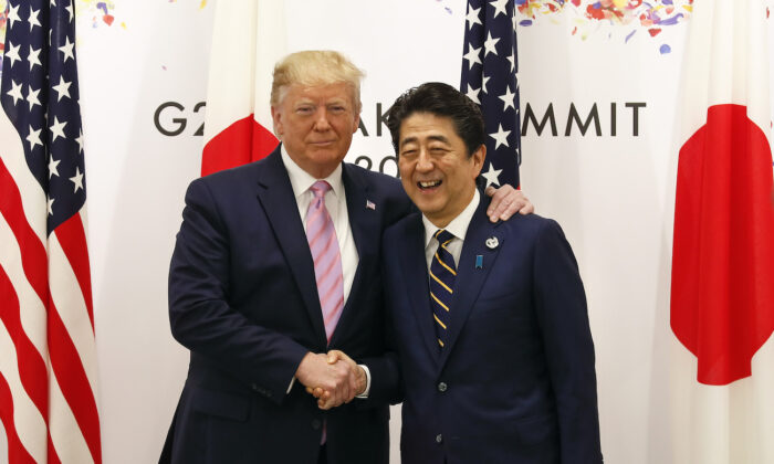 Then-U.S. President Donald Trump with then-Japanese Prime Minister Shinzo Abe at the start of talks at the venue of the G20 Summit in Osaka, Japan, on June 28, 2019. (Kimimasa Mayama/Pool/Getty Images)