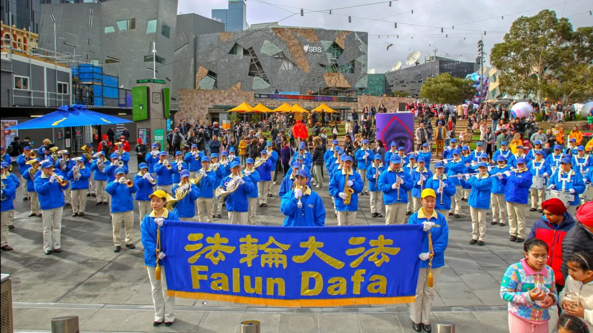 Tianguo Band performs at Federation Square in Melbourne, Australia on July 9, 2022. (Chen Ming/Epoch Times)