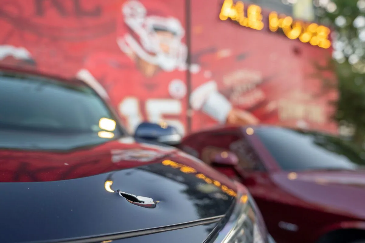 A bullet from an overnight shooting damaged a vehicle parked outside the Westport Ale House in the Westport area of Kansas City, Mo., on July 11, 2022. (Emily Curiel/The Kansas City Star via AP)