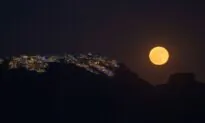 Supermoon Rises Behind Greece’s Ancient Temple of Poseidon