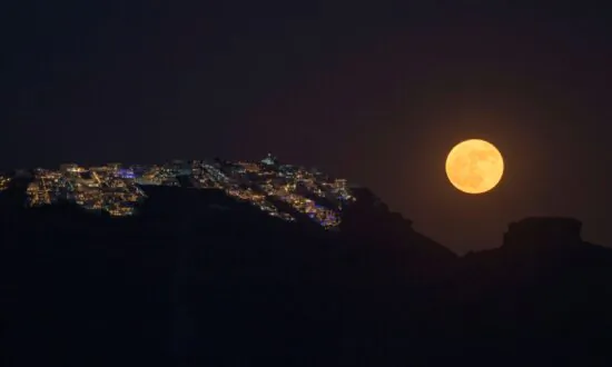 Supermoon Rises Behind Greece’s Ancient Temple of Poseidon