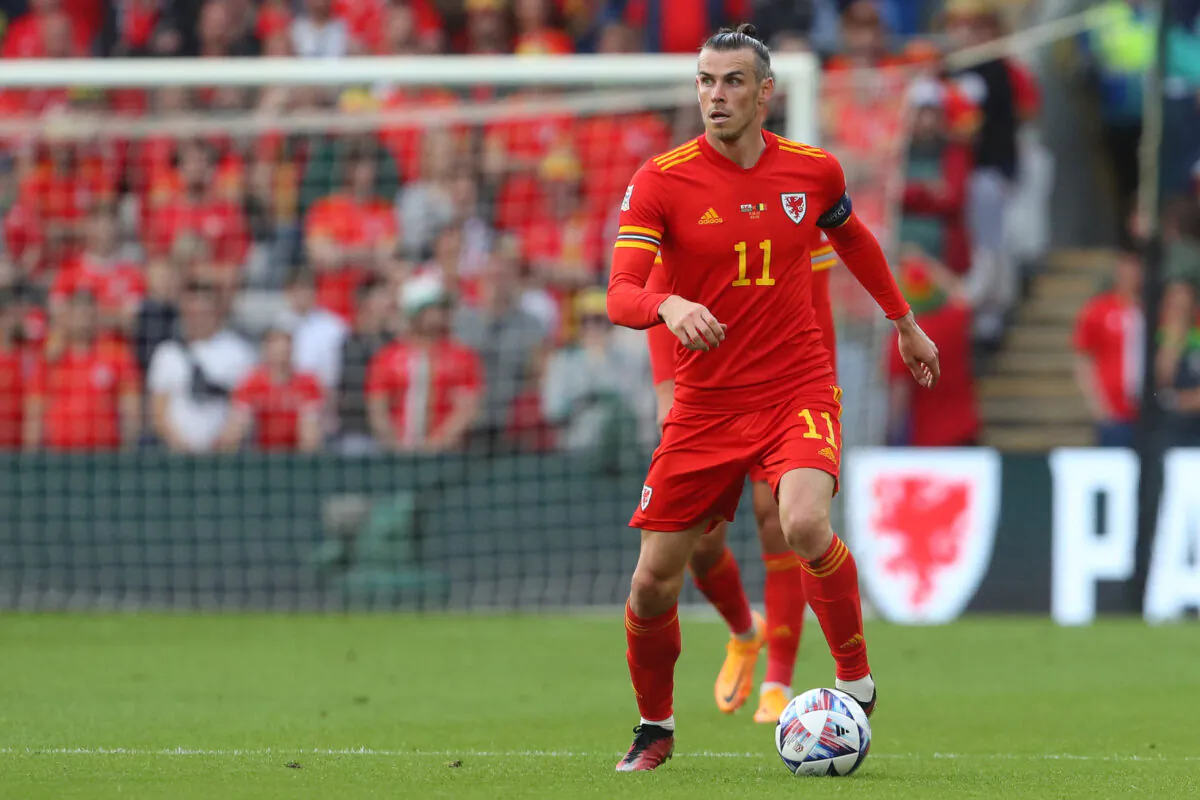 Wales' midfielder Gareth Bale runs with the ball during the UEFA Nations League - League A Group 4 football match between Wales and Belgium at the Cardiff City Stadium in Cardiff on June 11, 2022. (Geoff Caddick /Getty Images)