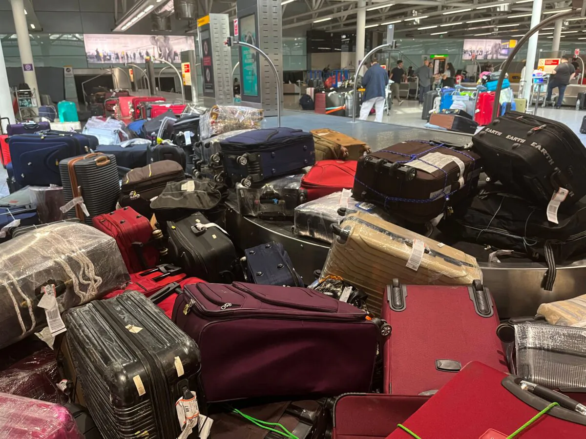 Suitcases are seen uncollected at Heathrow's Terminal Three baggage reclaim, west of London on July 8, 2022. (Paul Ellis/AFP via Getty Images)