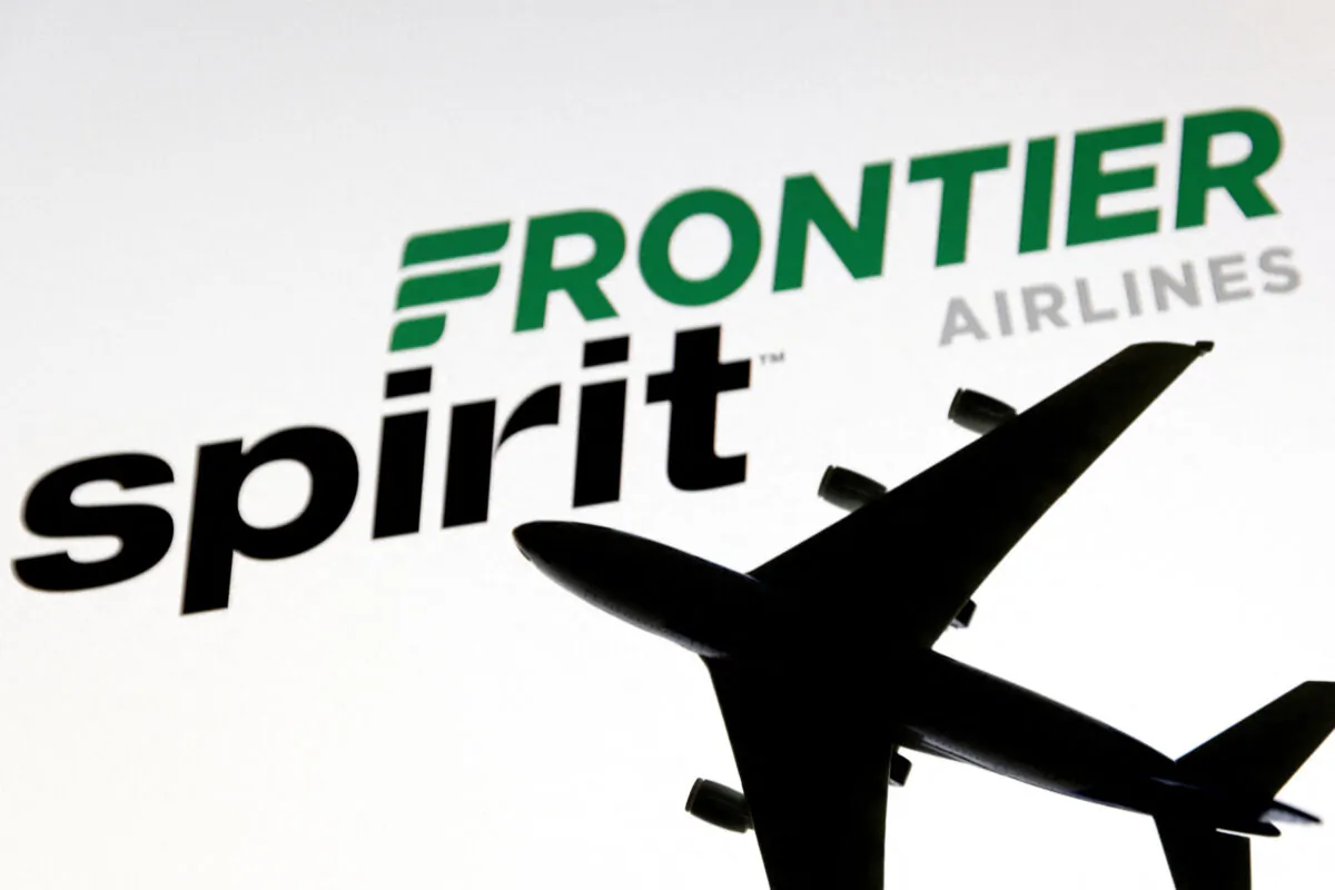 Spirit and Frontier Airlines logos in this illustration taken on June 27, 2022. (Dado Ruvic/Illustration/Reuters)