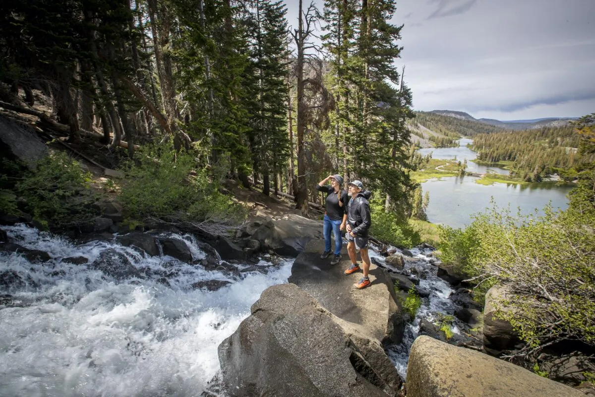 Visitors get a close-up view of the rush and spray of Twin Lakes Falls cascading down from Lake Mamie to Twin Lakes on June 22, 2022, in Mammoth Lakes, California. (Allen J. Schaben/Los Angeles Times/TNS)