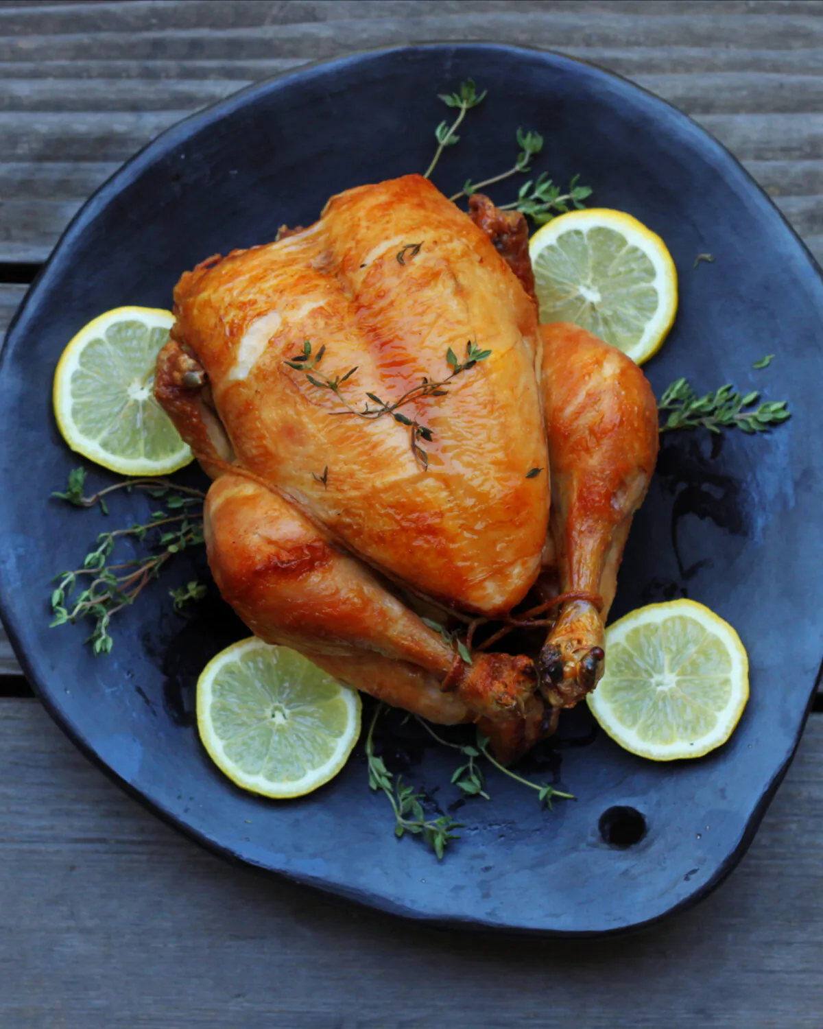  A whole roast chicken, which can be prepared in the oven or on the grill, is a simple, timeless meal. (Lynda Balslev for Tastefood)