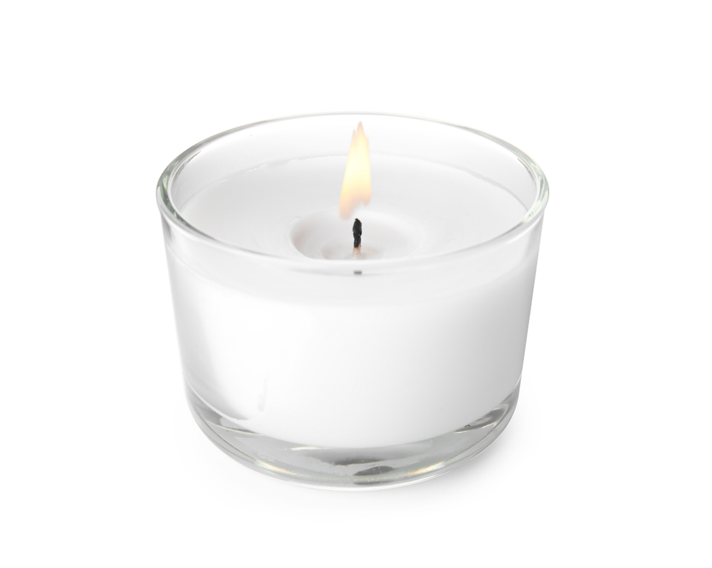 Wax,Candle,In,Glass,Holder,On,White,Background