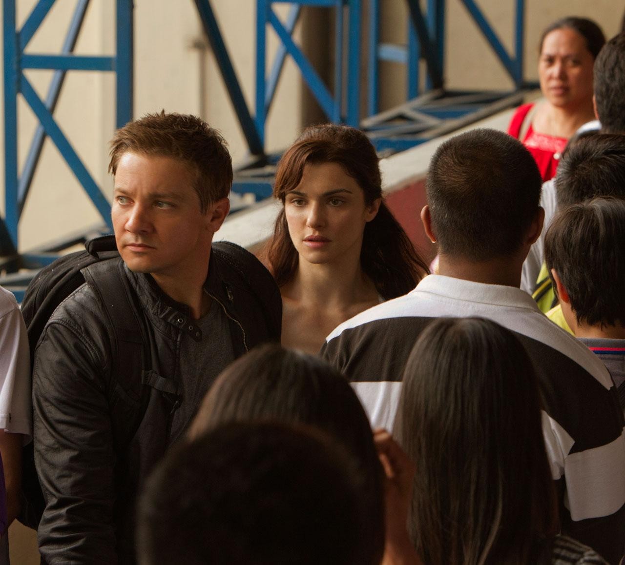 woman and man in a crowd in THE BOURNE LEGACY