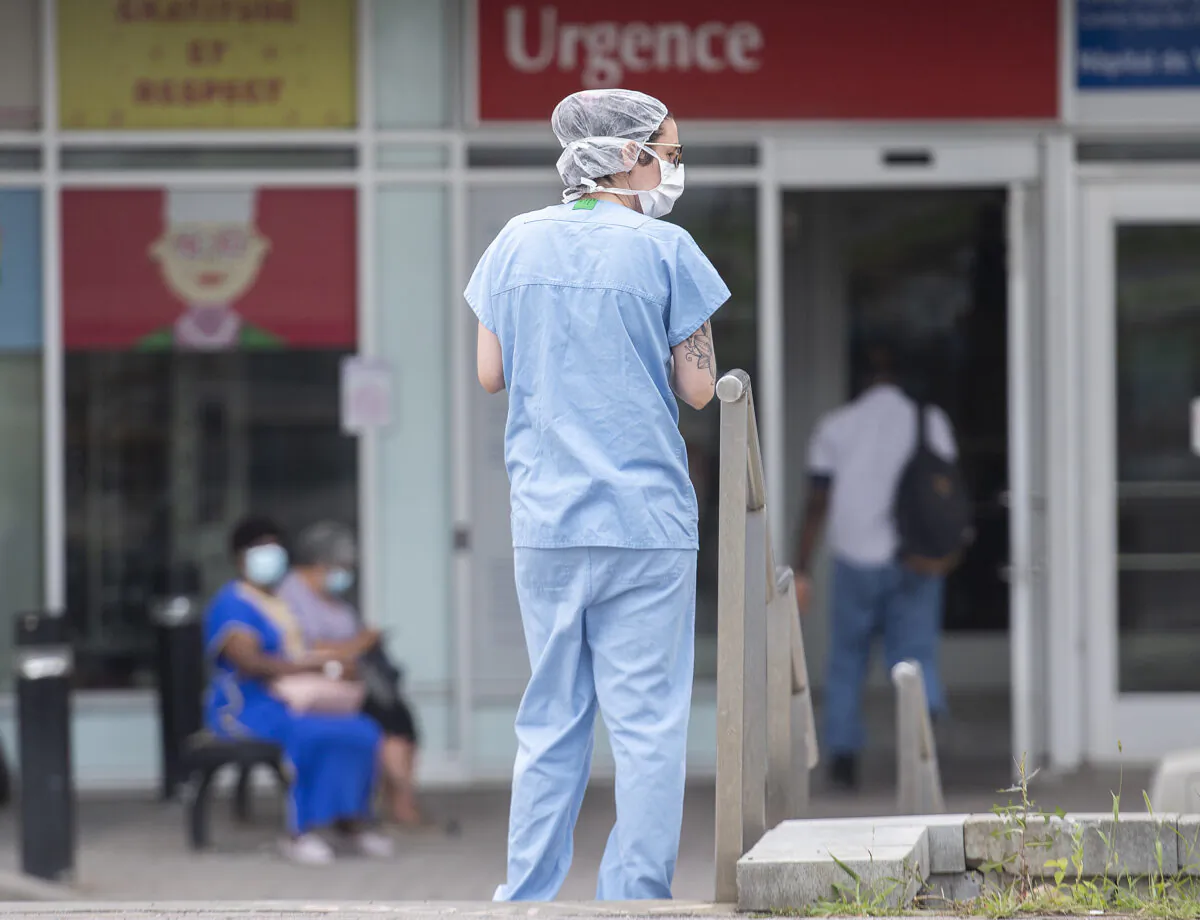 A health-care worker outside a hospital in Montreal on July 14, 2022. (Graham Hughes/The Canadian Press)