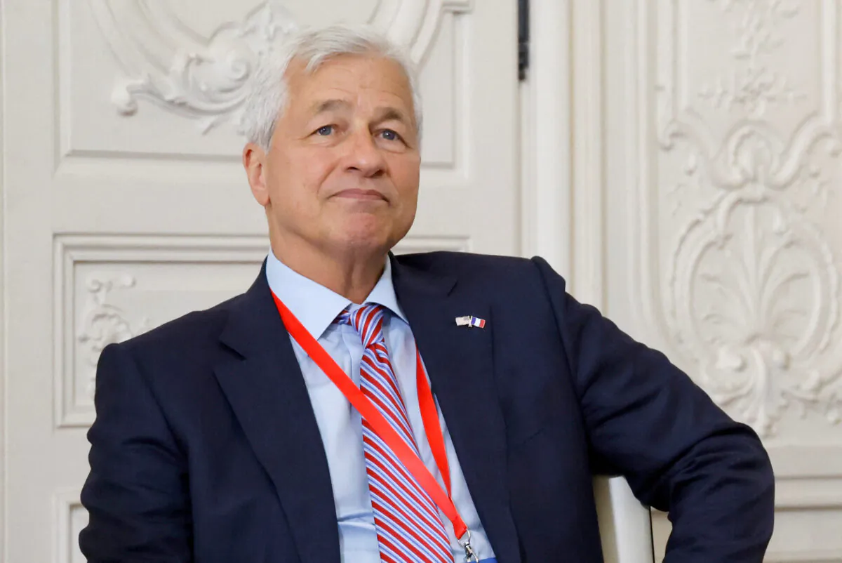 JP Morgan CEO Jamie Dimon looks on in a meeting with France's President Emmanuel Macron during a business summit, at the Palace of Versailles, southwest of Paris, on July 11, 2022. (Ludovic Marin/Pool via Reuters)