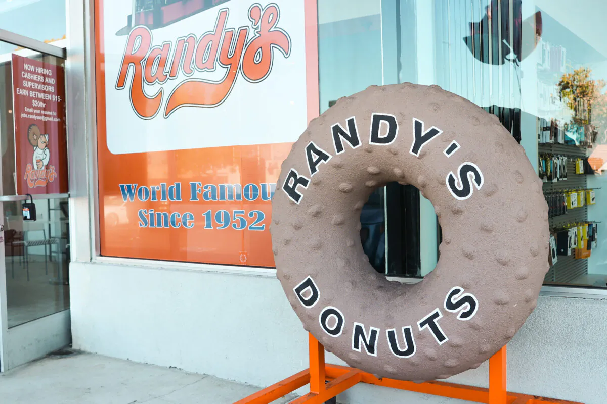 The exterior of a Randy's Donuts during its grand opening in Costa Mesa, Calif., on July 12, 2022. (Julianne Foster/The Epoch Times)