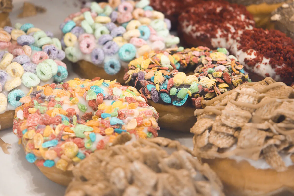 Donuts are on display at a Randy's Donuts grand opening in Costa Mesa, Calif., on July 12, 2022. (Julianne Foster/The Epoch Times)