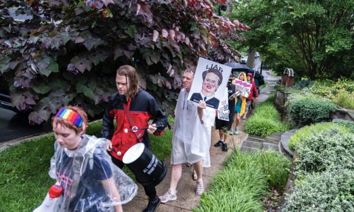 Protesters march past Supreme Court Justice Brett Kavanaugh's home in Chevy Chase, Maryland on June 8, 2022. (Nathan Howard/Getty Images)