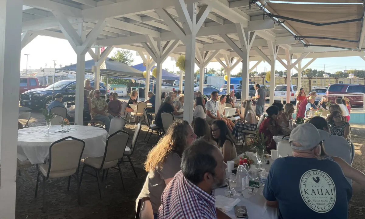 Volunteers attend Mary's Kitchen's final banquet to celebrate their memories of serving homeless people in the community in Orange, Calif., on July 10, 2022. (Carol Cassis/The Epoch Times)