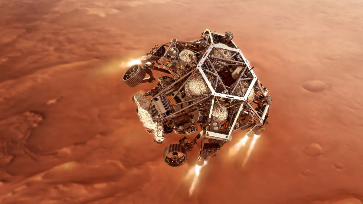 NASA’s Perseverance rover fires up its descent stage engines as it nears the Martian surface to land in the area known as Jezero crater on the planet Mars, in this concept illustraion provided by NASA. (NASA/Illustration via Getty Images)