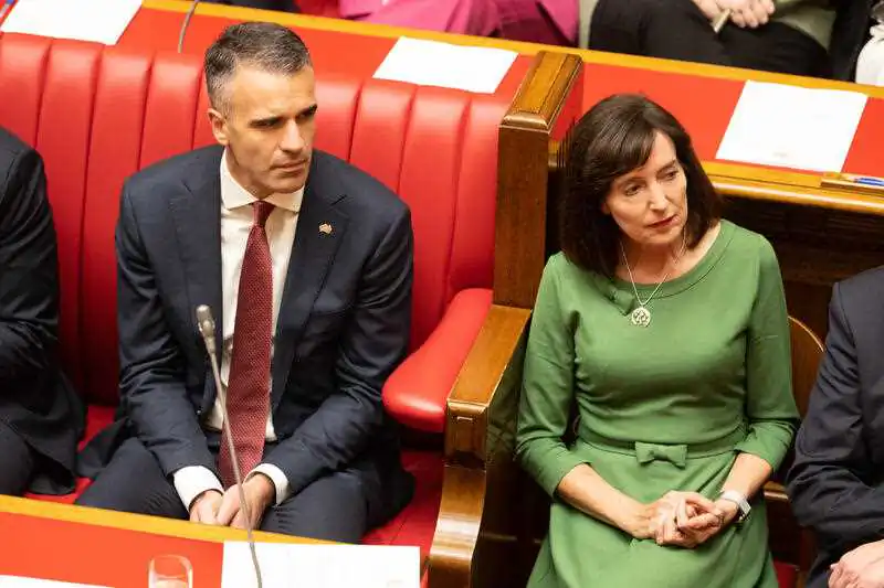 The Premier of South Australia Peter Malinauskas (L) and Deputy Leader Susan Close (R) listening to the Governor’s speech for the opening of the South Australian Parliament in Adelaide, Kaurna Yerta, Tuesday, May 3, 2022. (AAP Image/Morgan Sette)
