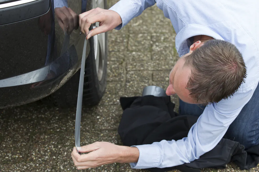 From a garden hose to a cracked bumper, duct tape is a handy—and sturdy—powerhouse around the house. (Photodiem/Shutterstock)