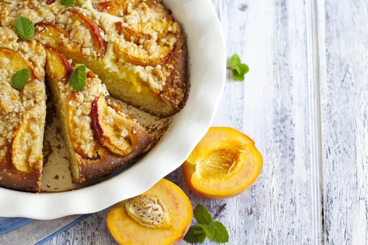 Peach cake is a delicious way to enjoy and share summer peaches. (AnjelaGr/iStock/Getty Images Plus)