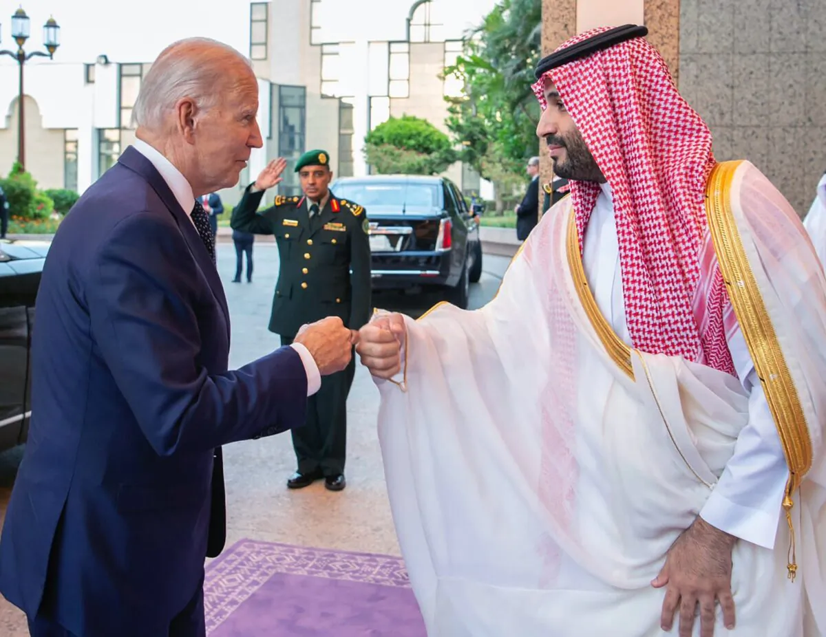 Saudi Crown Prince Mohammed bin Salman (R) greets U.S. President Joe Biden with a fist bump after his arrival in Jeddah, Saudi Arabia, on July 15, 2022. (Bandar Aljaloud/Saudi Royal Palace via AP)