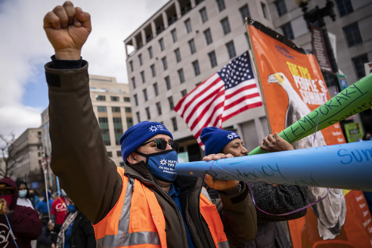 Activists participate in the Temporary Protected Status march in Washington on Feb. 23, 2021. (Drew Angerer/Getty Images)