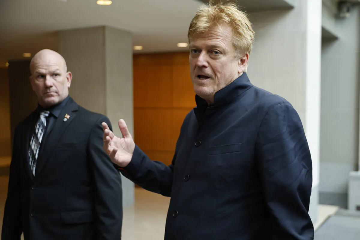 Former Overstock CEO Patrick Byrne talks to a reporter as he arrives at the Thomas P. O'Neill Jr. House Office Building to be interviewed the House select committee investigating the events on January 6, on July 15, 2022. (Chip Somodevilla/Getty Images)