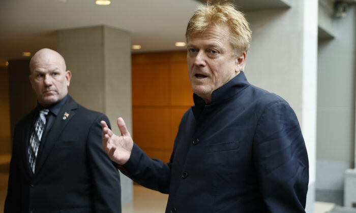 Former Overstock CEO Patrick Byrne talks to a reporter as he arrives at the Thomas P. O'Neill Jr. House Office Building to be interviewed the House select committee investigating the events on January 6, on July 15, 2022. (Chip Somodevilla/Getty Images)