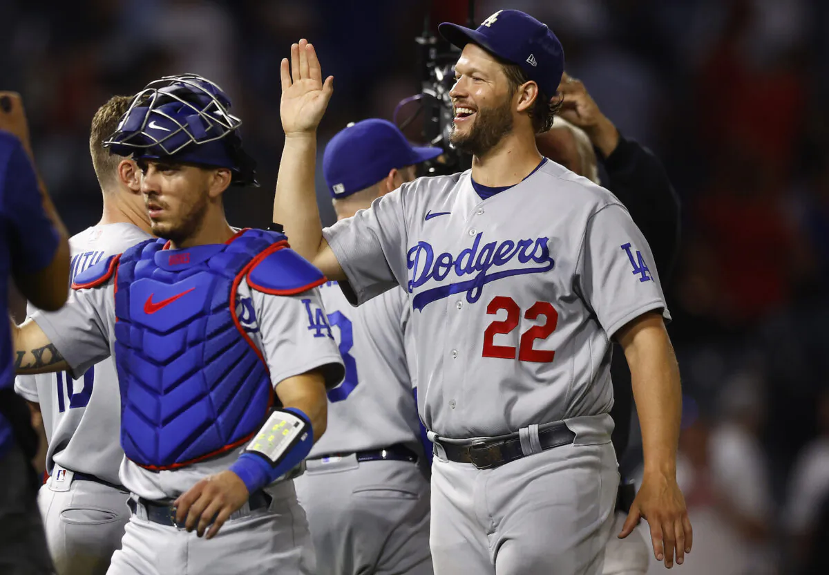 Clayton Kershaw #22 of the Los Angeles Dodgers celebrates a 9-1 win against the Los Angeles Angels at Angel Stadium of Anaheim, in Anaheim, on July 15, 2022. (Ronald Martinez/Getty Images)