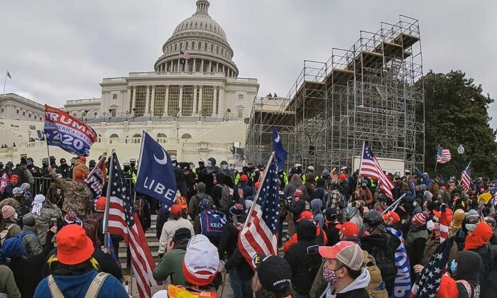 Protesters gather at the police line on the west side of the U.S. Capitol on Jan. 6, 2021. (Special to The Epoch Times)