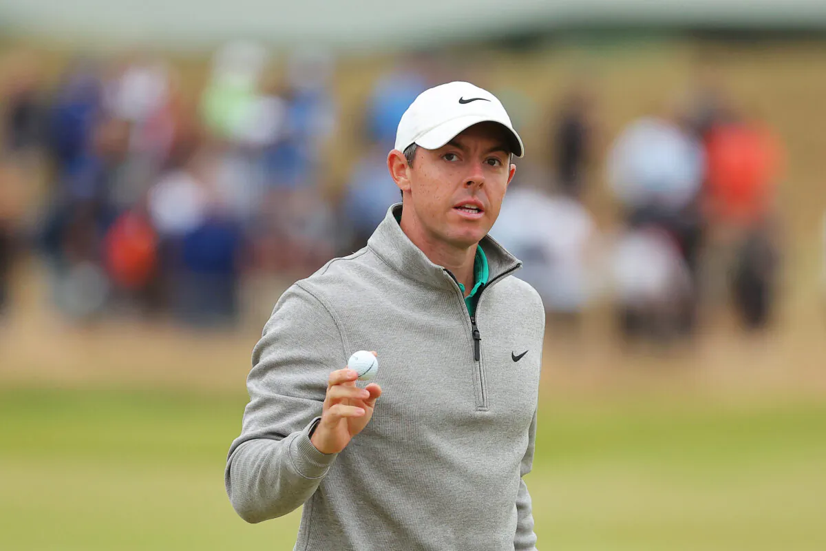 Rory McIlroy of Northern Ireland acknowledges the crowd on the 16th green during Day Three of The 150th Open at St Andrews Old Course in St Andrews, Scotland, on July 16, 2022. (Kevin C. Cox/Getty Images)
