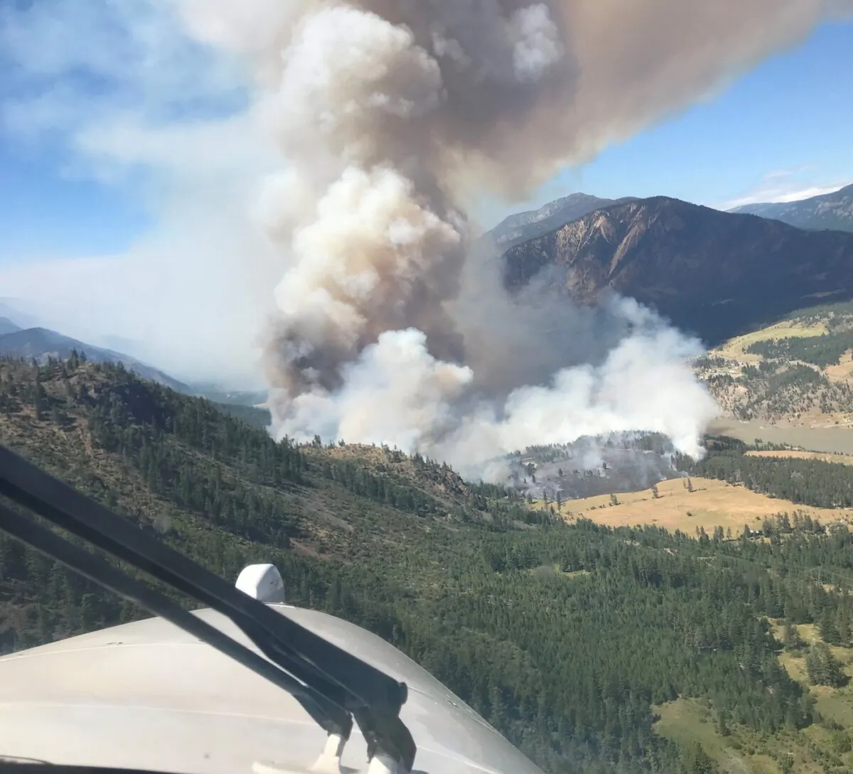 A wildfire blazing just west of Lytton, B.C., as shown in this handout image provided the BC Wildfire Service has now scorched five square kilometres of trees and bush, more than doubling in size in less than 12 hours. (The Canadian Press/HO-BC Wildfire Service)