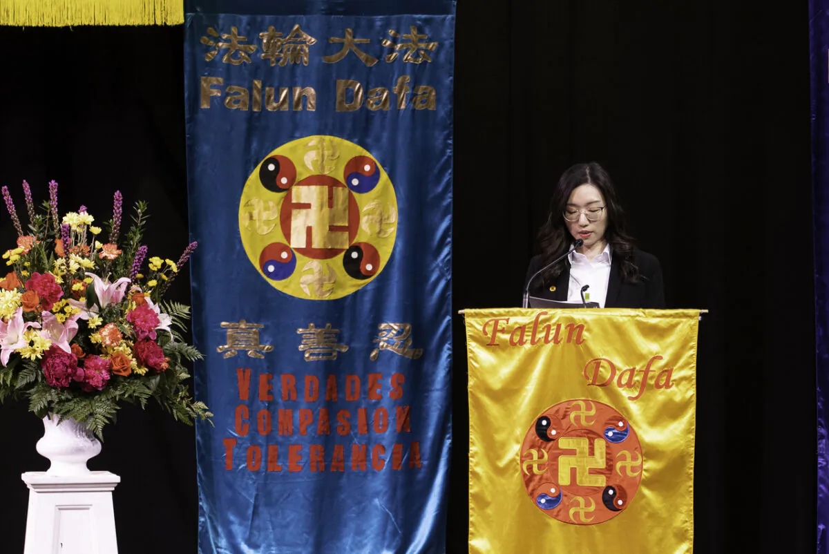 A Falun Gong adherent speaks during an all-day experience-sharing conference in Toronto on July 16, 2022. (Evan Ning/The Epoch Times)