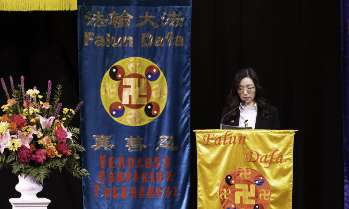 A Falun Gong adherent speaks during an all-day experience-sharing conference in Toronto on July 16, 2022. (Evan Ning/The Epoch Times)