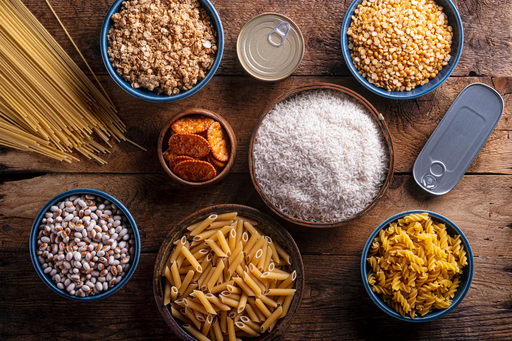 Stock up on versatile, shelf-stable, foundational foods, such as rice and pasta; you can build endless meals from these. (Foodio/Shutterstock)