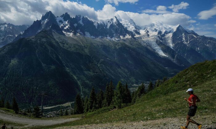 An athlete runs in the 42kms Mont Blanc marathon in Chamonix, south-eastern France, on June 26, 2022. (AFP via Getty Images/Olivier Chassignole)