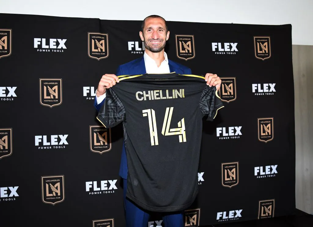Defender Giorgio Chiellini poses with his jersey after he was introduced by Los Angeles Football Club during a news conference at Banc of California Stadium in Los Angeles on June 29, 2022. (Kevork Djansezian/Getty Images)