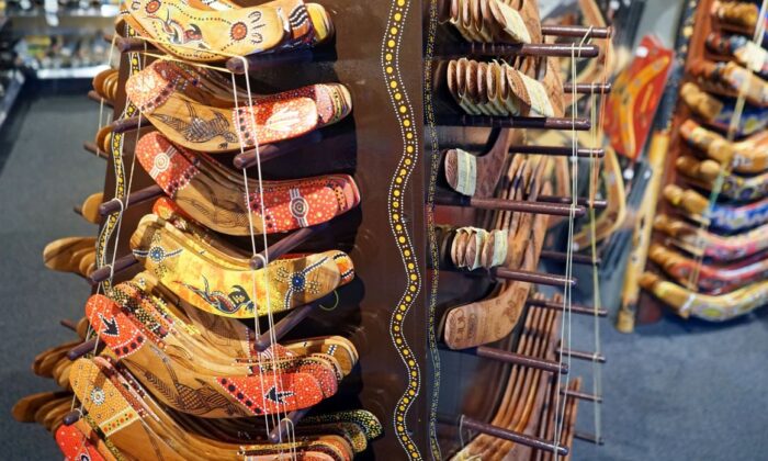 Hand-painted boomerangs stacked for display (Catrin Haze/Adobe Stock)